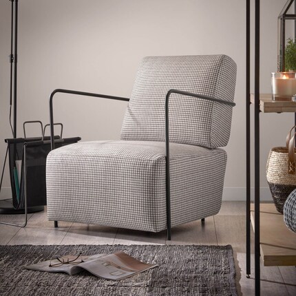 This armchair is practically snuggling into the floor. Image 1: Zuiver. Images 2 and 3: Kave Home.