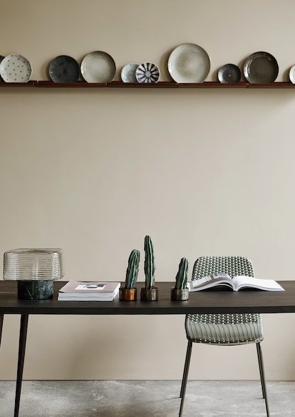 On the wall, the plates look twice as good and don't get in anyone's way.