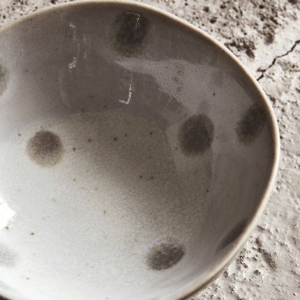 Freckles are facial decorations. Speckles are ceramic decorations.