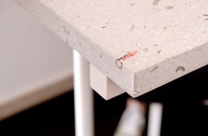 The Bob dining table is made from waste nail varnish and a sand mix. Image: Thomas Kunz