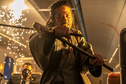 This, too, is part of the show: a katana-wielding gangster.