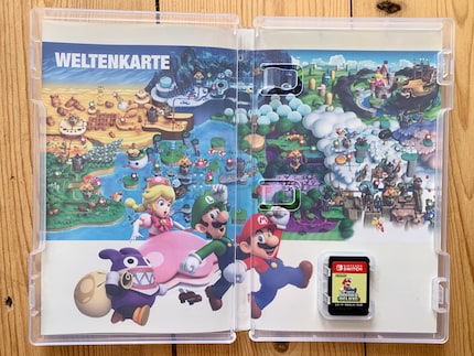 Künstlerisch wertvoll ist diese Übersichtskarte bei New Super Mario Bros. U Deluxe, hilfreich eher weniger.