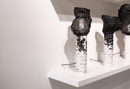 Upcycling VHS tapes: the lamps consist of a special gypsum and a mesh created using magnetic tape.