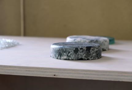 Depending on the type of residue, the tiles can be speckled with red, blue or green.