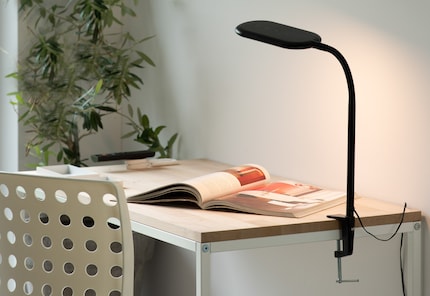 Kelly is a simple desk lamp. Even their switches are integrated into the head of the lamp.