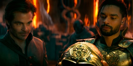 Edgin (Chris Pine) and Xenk (Regé-Jean Page) in search of a valuable relic.