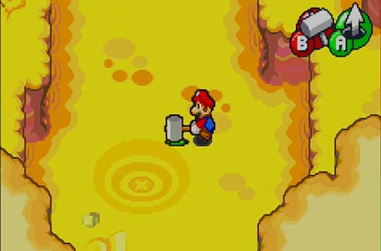 Avec le marteau, Mario enfonce son frère dans la terre pour qu’il cherche des trésors enfouis.