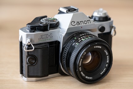 Good Canon AE-1 Programs cost around 200 francs. Mine works perfectly.