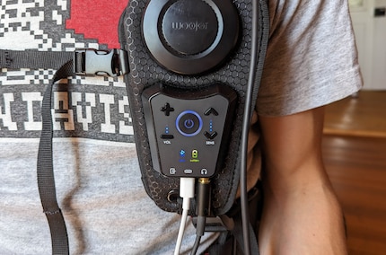 I can adjust the volume and vibration strength on the vest.