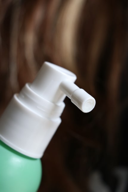 The elongated spray head allows for targeted application.
