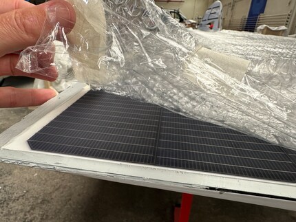 The solar cells are sensitive, which is why they’re covered in bubble wrap.