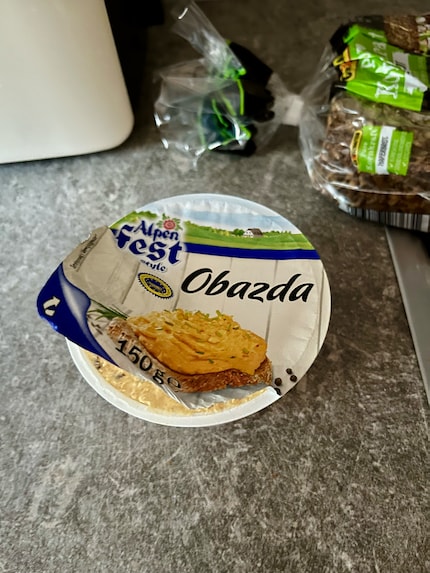 Obazda is a wonderful thing. I like eating this Bavarian cream cheese at home, too. Minus the tight «dirndl», of course. Photo: Anika Schulz