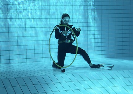 To complete this knot-tying exercise in a 4.5-metre deep free-diving pool, you need to be able to hold your breath for a minute.