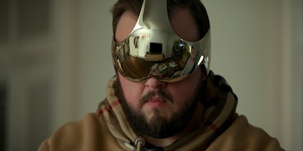 Game of Thrones star John Bradley playing billionaire Jack Rooney doesn’t exist in the novel.