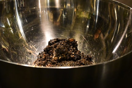 Moist houseplant soil serves as a building material.