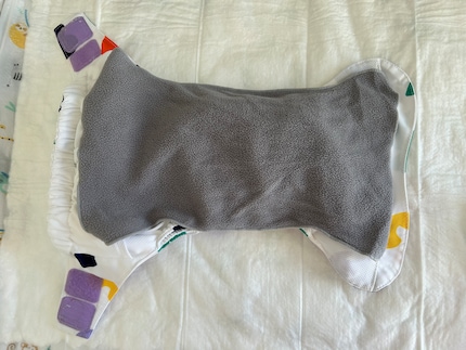 The nappy fleece is placed on top.