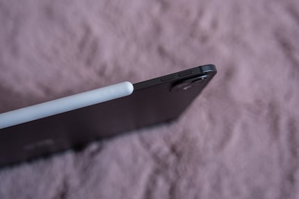 The iPad Pro (13-inch version shown) is thinner than the Apple Pencil.
