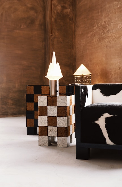 The «Xadrez» collection, including an armchair, is made of coconut fibre, enamel paint and natural cowhide.