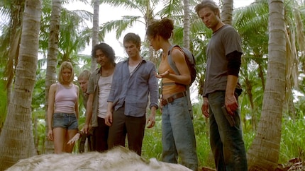 Sawyer (far right) shoots a polar bear in the jungle. WTF?