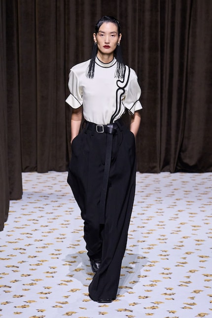 Dangling earrings and belt ends were all over Jil Sander’s spring 2025 collection.