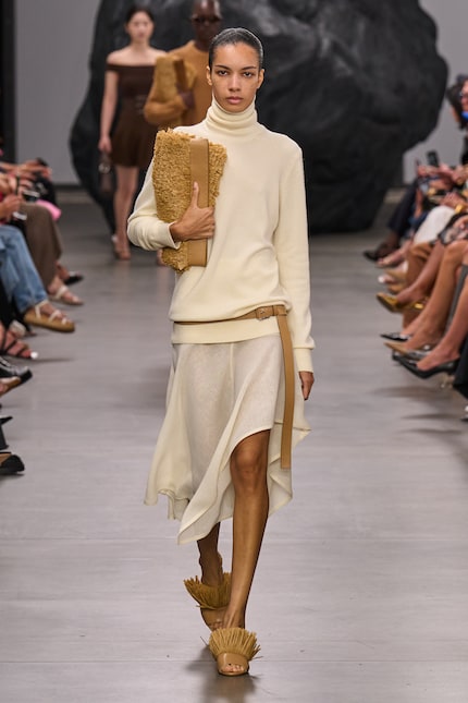 Here’s a Michael Kors look featuring a belt hanging down at the side.