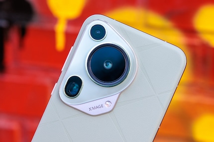 The telephoto and ultra-wide-angle cameras are pretty inconspicuous compared to the main camera.