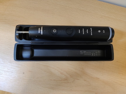 The travel charging case is small…