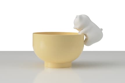 Le chaton souffle sur les aliments chauds et les boissons pour vous éviter d'avoir à le faire.
