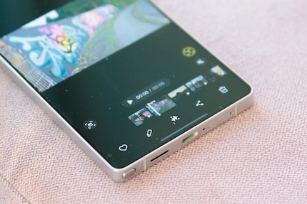 The audio eraser is the centre icon with the stars.