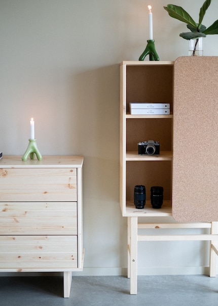 As a front, cork embellishes cabinets and improves room acoustics.