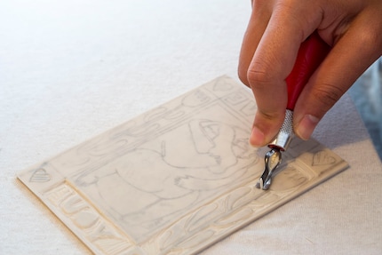 The safety cutter gives me an indication of how deep the outlines should be. 