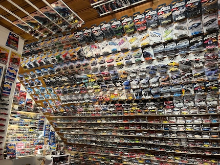 Not an inch of free space: the cars are spread all over the room.