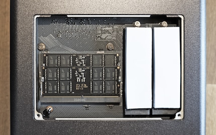 Cooling pads on the SSDs and the cover on the top
