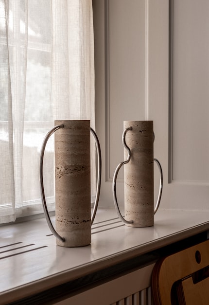 Ambi Vases, travertine and aluminium, Matteo Fogale and Tim Royal.