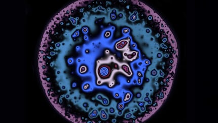 A very thin film of beer can be seen between two bubbles. The different colours correspond to different film thicknesses.